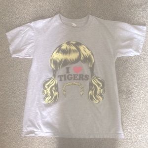 This is a “I love tigers” shirt from 5 below in a size s